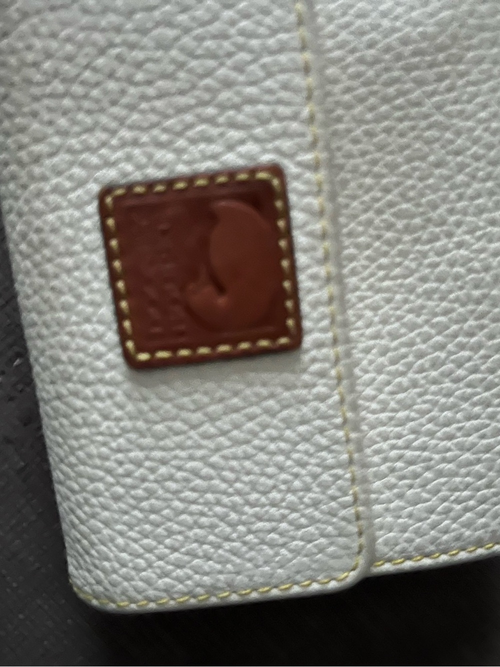 Dooney & Bourke White Pebbled Leather Trifold Wallet with Brown Logo Patch - Picture 4 of 4